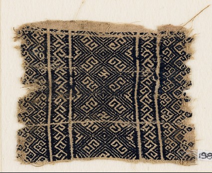 Textile fragment with diamond-shapes and S-shapesfront