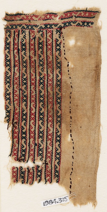 Textile fragment with bands of S-shapes and diamond-shapesfront