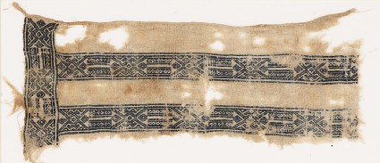 Textile fragment with linked hexagons, squares, and S-shapesfront