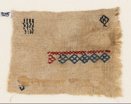 Textile fragment with diamond-shapes and crossesfront