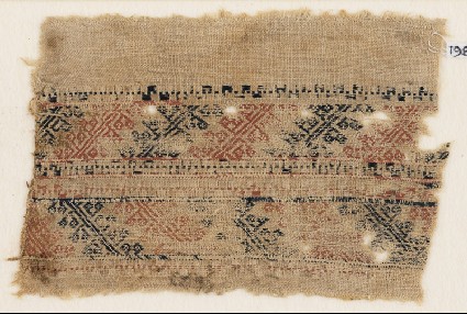 Textile fragment with bands of S-shapes and stylized shapes, possibly flowersfront
