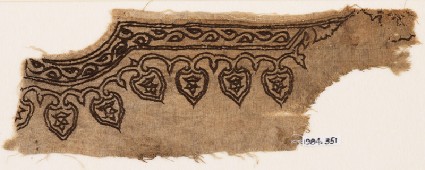 Textile fragment from the neck of a garment with vines and leavesfront