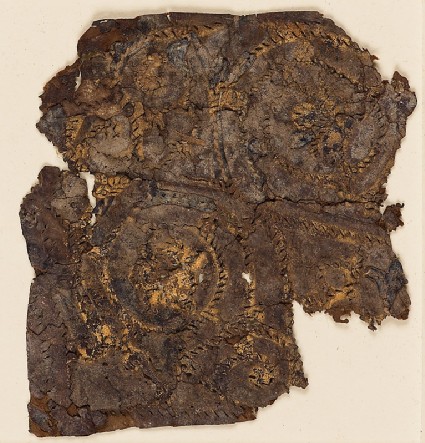 Textile fragment with trefoil scrollfront