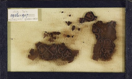 Group of textile fragments with quatrefoilsfront