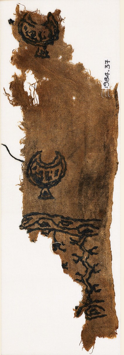 Textile fragment with crescents or cups, chevrons, and vinefront