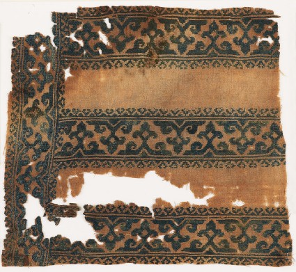 Textile fragment with tendrils, trefoils, and foliate bordersfront