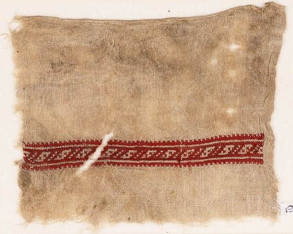 Textile fragment with band of S-shapesfront
