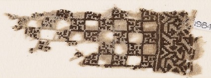 Textile fragment with linked squares and swastikasfront