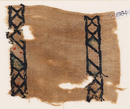 Textile fragment with rhombuses and diamond-shapesfront