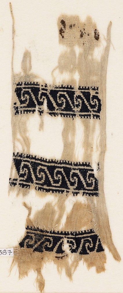 Textile fragment with scrollsfront