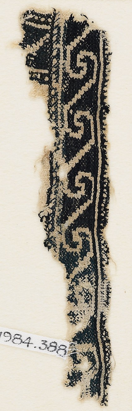 Textile fragment with scrollsfront
