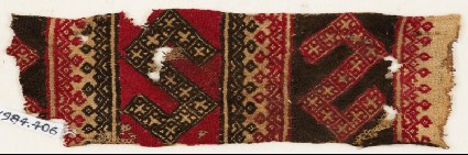 Textile fragment with two large S-shapesfront
