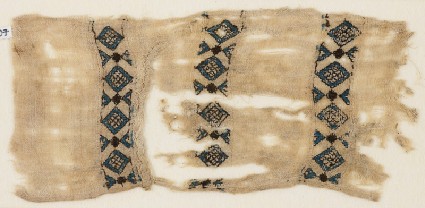 Textile fragment with three bands of diamond-shapesfront