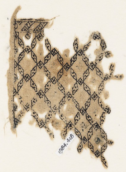 Textile fragment with grid of lozengesfront