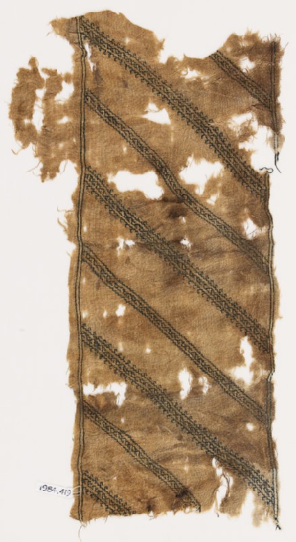 Textile fragment with stripes of vines and leavesfront