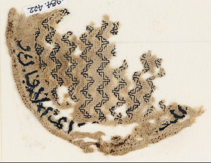 Textile fragment, possibly from a lid coverfront