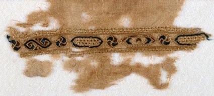 Textile fragment with band of linked cartouches and circlesfront