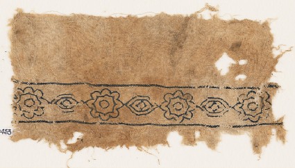 Textile fragment with alternating rosettes and medallionsfront