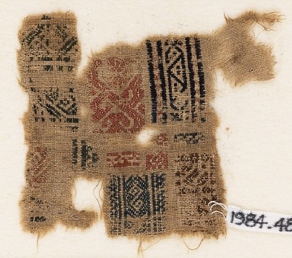Sampler fragment with bands of S-shapes and trianglesfront