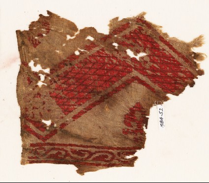 Textile fragment with chevron, fleur-de-lys, and vinefront