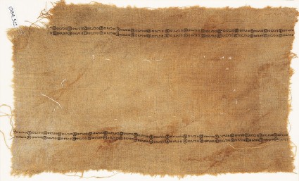 Textile fragment with two parallel bands of circles and S-shapesfront