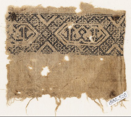 Textile fragment with band of linked hexagonsfront