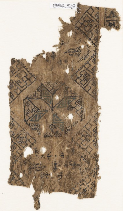 Textile fragment with octagon containing an eight-pointed starfront