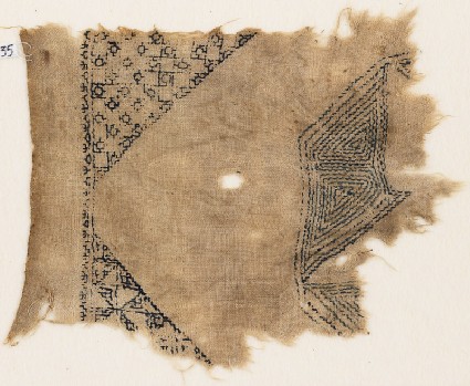 Textile fragment with squares and diamond-shapesfront