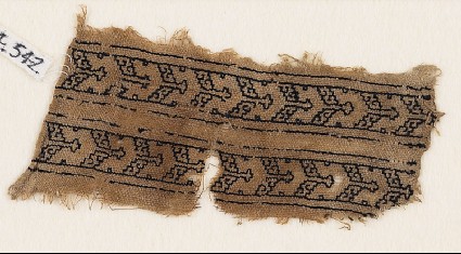 Textile fragment with chevrons and S-shapesfront