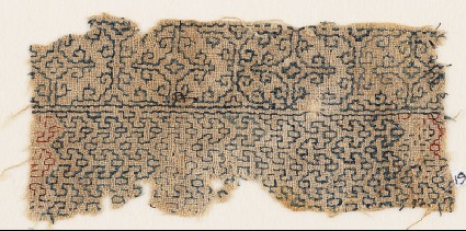 Textile fragment with interlacing chevrons and Maltese crossesfront