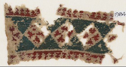 Textile fragment with diamond-shapes containing Maltese crossesfront