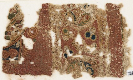 Textile fragment with medallions or scrollsfront