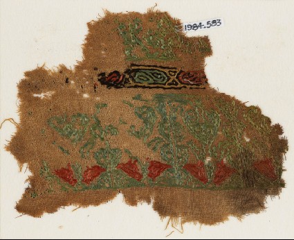 Textile fragment with pairs of birds facing each otherfront