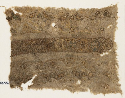 Textile fragment with linked circles and paired birdsfront