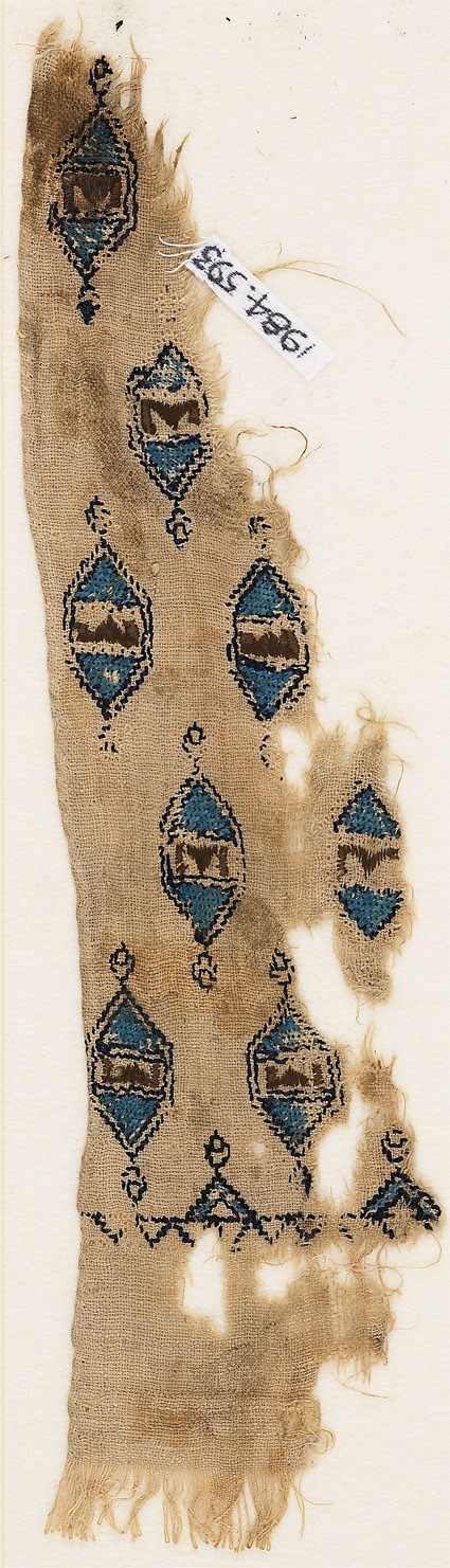 Textile fragment with hexagonal medallions and pseudo-inscriptionfront