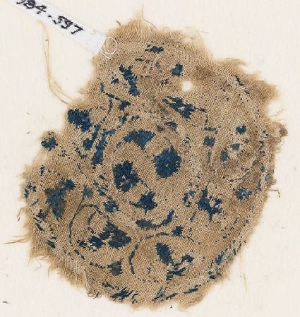 Textile fragment with vines and tendrilsfront