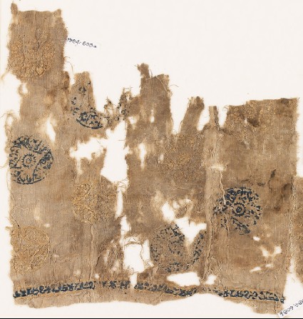 Textile fragment with circles containing lozengesfront