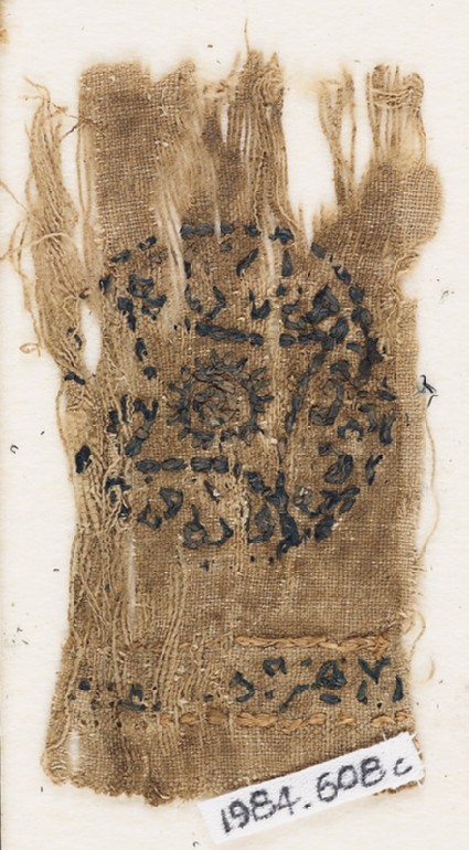 Textile fragment with circles containing lozengesfront