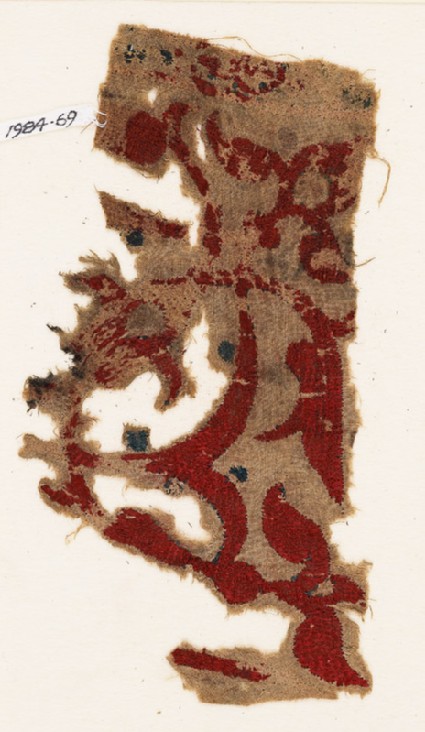 Textile fragment with vine, leaves, and trefoilsfront