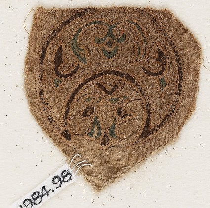 Roundel textile fragment with blazonfront