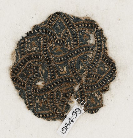 Roundel textile fragment with interlacefront