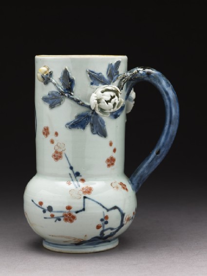 Tankard with modelled flowers and leavesside