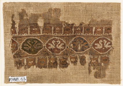 Textile fragment with linked medallions and birdsfront