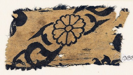 Textile fragment with flowers and leavesfront