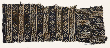 Textile fragment with rosettes, squares, and dotsfront