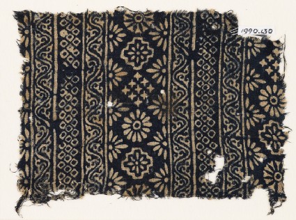 Textile fragment with carnations, stepped squares, stars, and rosettesfront
