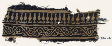 Textile fragment with vine and stylized bodhi leavesfront