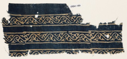 Textile fragment with bands of vines and leavesfront