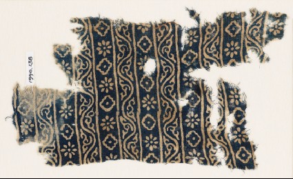 Textile fragment with bands of vines, rosettes, and diamond-shapesfront
