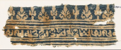 Textile fragment with inscription, lines, stylized palmettes, and possibly treesfront